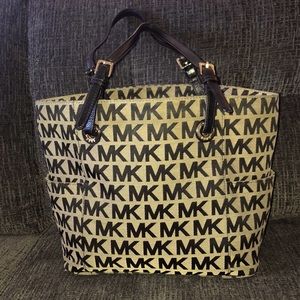 Michael Kors beautiful tan cloth tote w/black MK